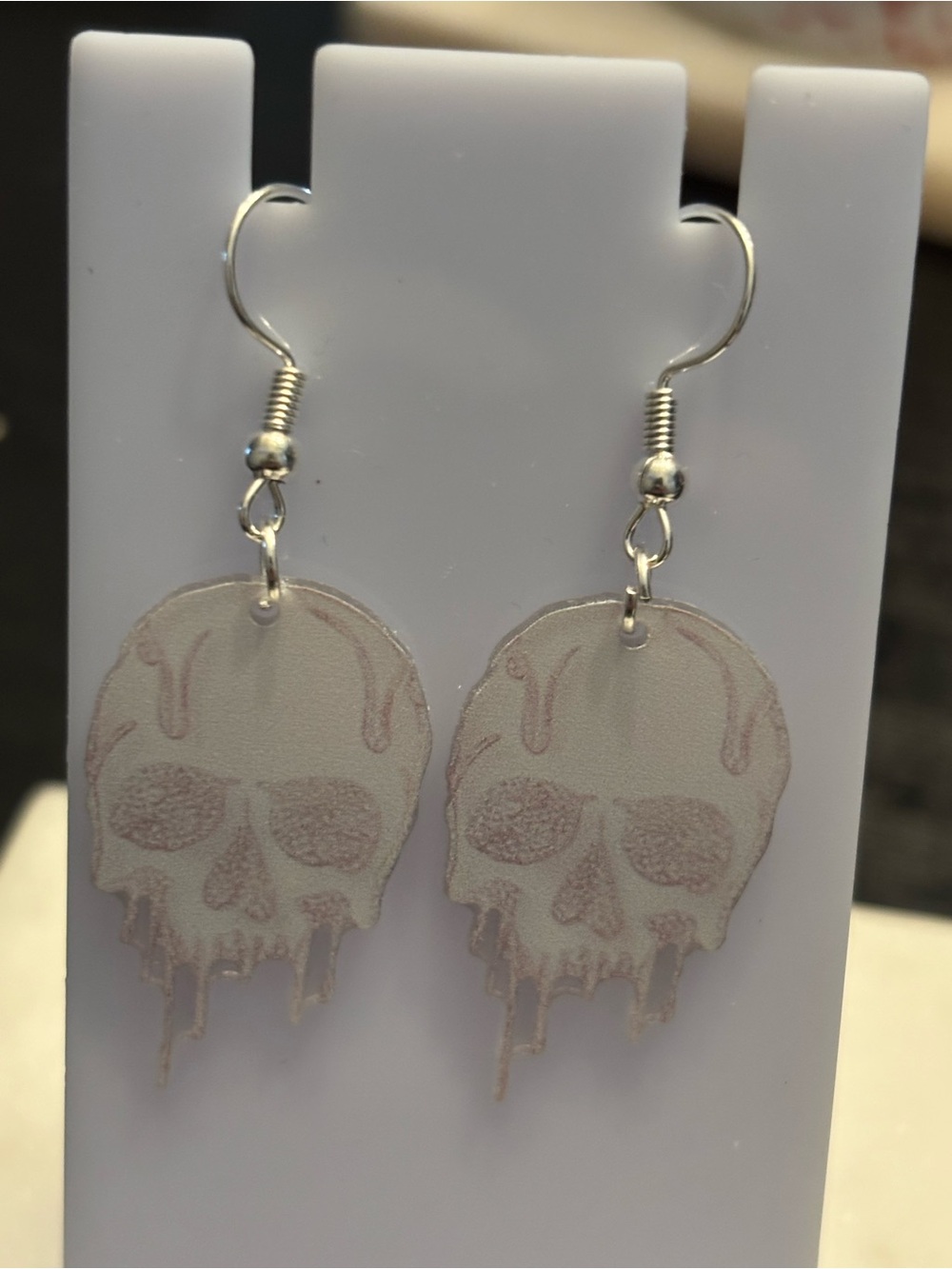 Title: Melting Skull Acrylic Dangle Earrings | Dripping Skull Frosted Clear Grey